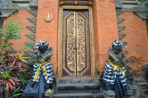Statues of Demon gods (raksasa) at Ornate Temple Entrance Stock Photos