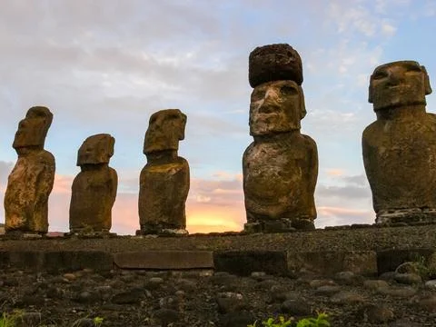 Statues of Easter Island in the background of the sunset. melting of the East Stock Photos