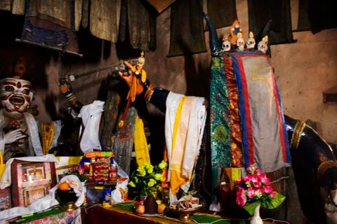 Statues of guardian deities, whose heads are uncovered only during the festiv Stock Photos