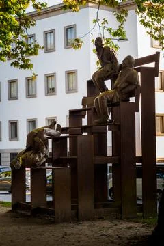 Statues having fun in a park in the center of Porto, Portugal Stock Photos