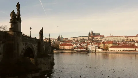 Statues of Karluv Most (Charles Bridge)  on vitava river Stock Footage 132346905