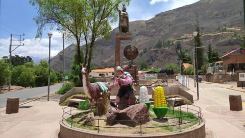Statues of a man, alpaca and corn in Lamay near Cusco, Peru. Stock Footage 288496248