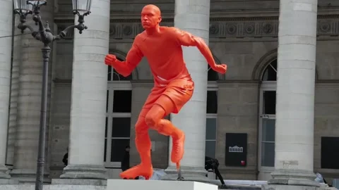 Statues of Mbappé, "Bebe" Vio and LeBron James are installed at the Brongniart P Stock Footage 270791574