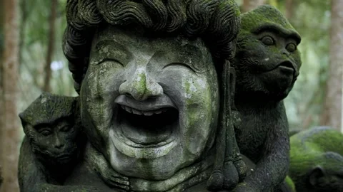 Statues of monkeys in the forest in Bali Stock Footage 229824774