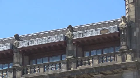 Statues of people on a building Stock Footage 92094858