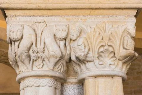 Statues on pillar Stock Photos