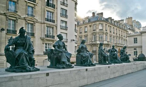 Statues of six continets in front of Orsay Museum Stock Photos