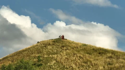 Statues on top of a mountain parallax effect aerial shot french alps sunny day Stock Footage 223355843