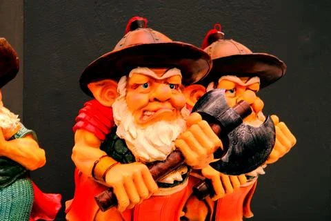 A statuette with an axe. dwarf.A ceramic toy.tin soldiers.A miniature plastic so 写真素材