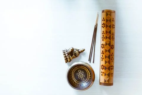 The statuette of the Buddha's blessing and incense. Stock Photos