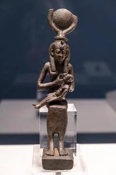  statuette of the goddess Isis with her son Horus statuette of the goddess... Stock Photos