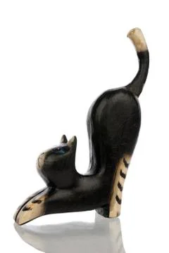 Statuette of kat left side isolated in white Stock Photos
