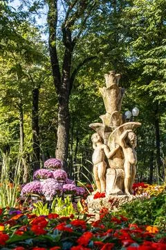 Statuettes representing children in the form of an artesian fountain, Stock Photos