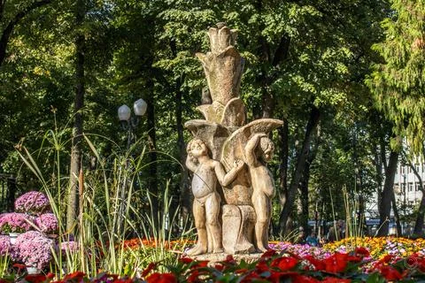 Statuettes representing children in the form of an artesian fountain, Stock Photos