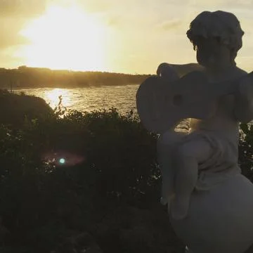 Staute in sunset Stock Photos