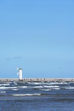 The Stav Mlyny navigation mark in theform of a stylized white windmill tower Stock Photos
