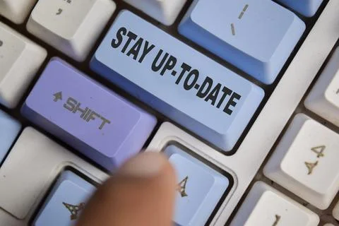 Stay up-to-date on the button keyboard Stock Photos