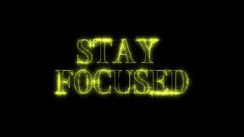 Stay focused text animation with glowing golden particles on a black background Stock-Footage 337465706