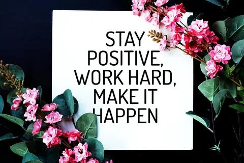 Stay Positive, Work Hard, Make It Happen text with flower decoration on bla.. Stock Photos