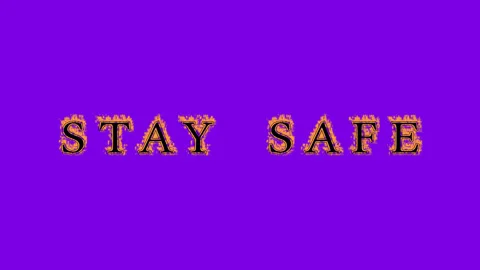Stay Safe fire text effect violet background 스톡 동영상 136314325