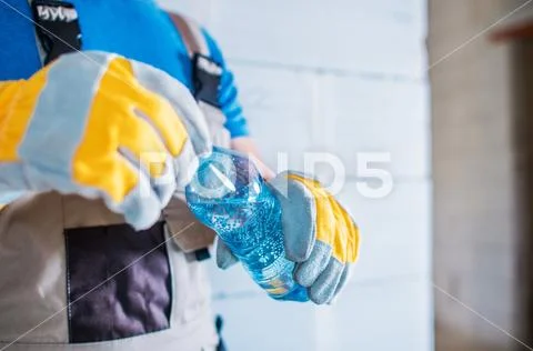 Staying Hydrated at Work. Body Hydration on the Construction Site. Stock Photos