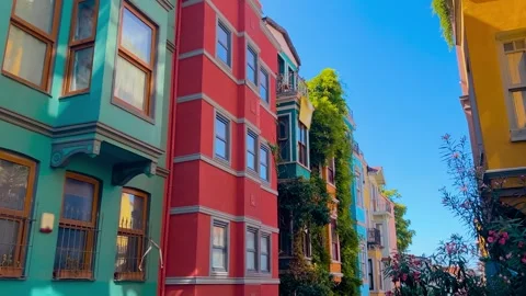Steadicam camera moving along colorful buildings in Balat, Istanbul Stock Footage 346486824