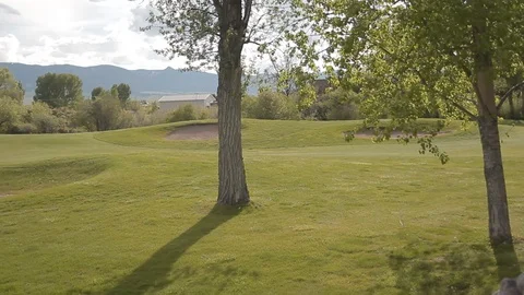 Steadicam Golf Course By Mountains Stock Footage 106678090