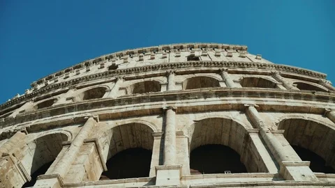 Steadicam low angle shot: Ancient coliseum in Rome, Italy. Stock Footage