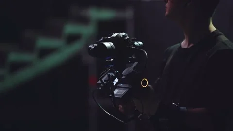 The steadicam operator is working Stock Footage 228103712