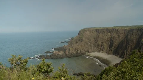Steadicam shot of huge beautiful cliffs along the ocean, 4k Stock Footage 112763735