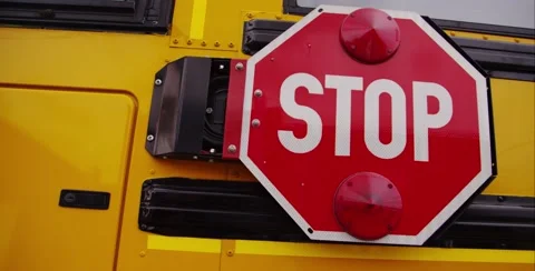 Steadicam From Stop Sign to Front of Bus Stock-Footage 53397941