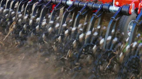 Steadicam tracking shot: A close-up of a part of an agricultural machine is a Stock Footage 74462114