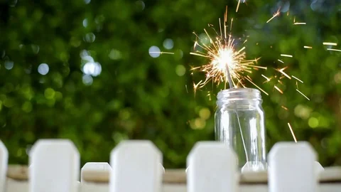 Steady camera focus on fireworks candle in a bottle Vídeos de archivo 87738136