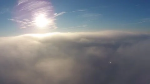 Steady camera just above dense fog at sunrise Video stock 43737460