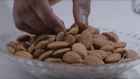 A steady mid-close shot of a set of Almonds Stock Footage 280337704