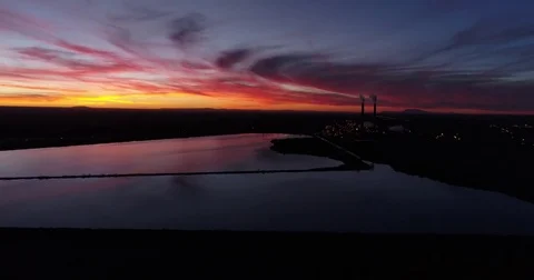 Steady move over a sunset reflection Stockbeeldmateriaal 84329709