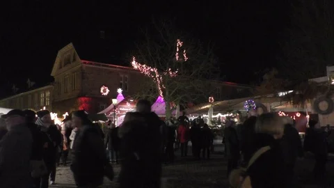 Steady night shot walking crowd at Bueckeburger Christmas Market, HDR Stock Footage 99540548