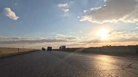 Steady road trip along Cairo Fayoum Desert Road through Egypt quiet desert Stock Footage 330078281