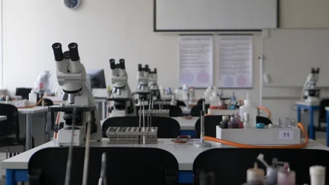 Steady shoot of a laboratory going true tables prepared for work and do Video stock 119009560
