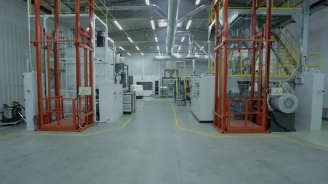 Steady shot inside a large industrial manufacturing company workshop. Stock Footage 105835948