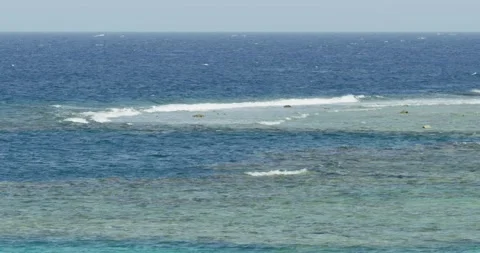 A steady shot of small sea waves Video stock 209950851