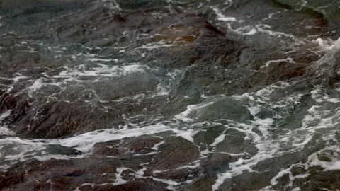 Steady Shot Turquoise Swells Hitting Jagged Coastal Rocks Stock Footage 322055751