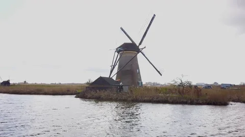 Steady shot of a windmill in action at Kinderdijk Stock Footage 104779423