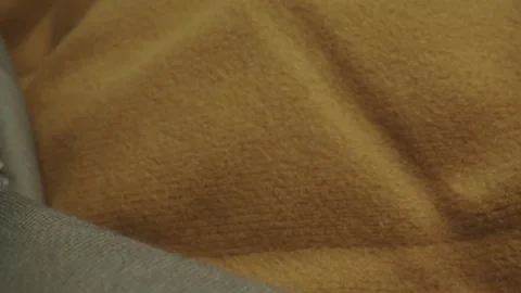 Steady slide across wool garment, closeup details 스톡 동영상 241765708
