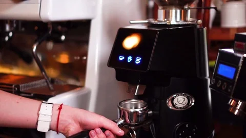 Steady slow motion view on female barista hand working with espresso coffee Stock Footage 103992976