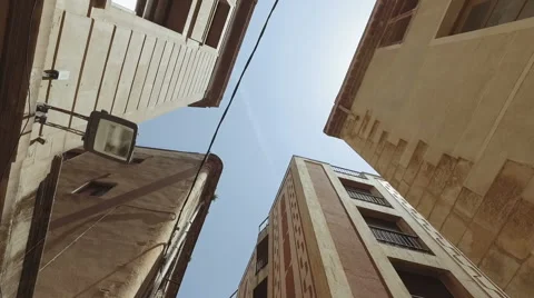 Steadycam moving view of old builings in gothic district Stock Footage 63618063