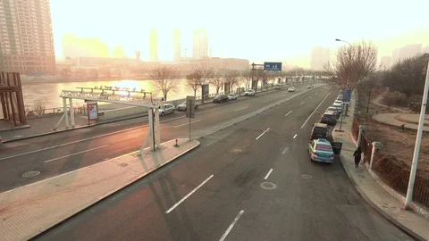 Steadycam side shot of small traffic in the china city Stock Footage 73223121