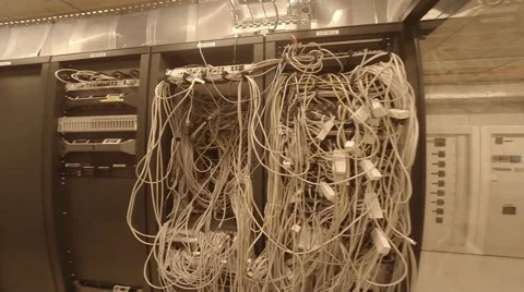 Steadycam walk along a wall of racks in server room Video stock 57764553