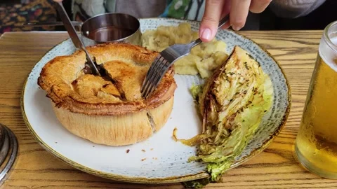 Steak and Ale Pie with Roasted Cabbage Stock Footage 292274367