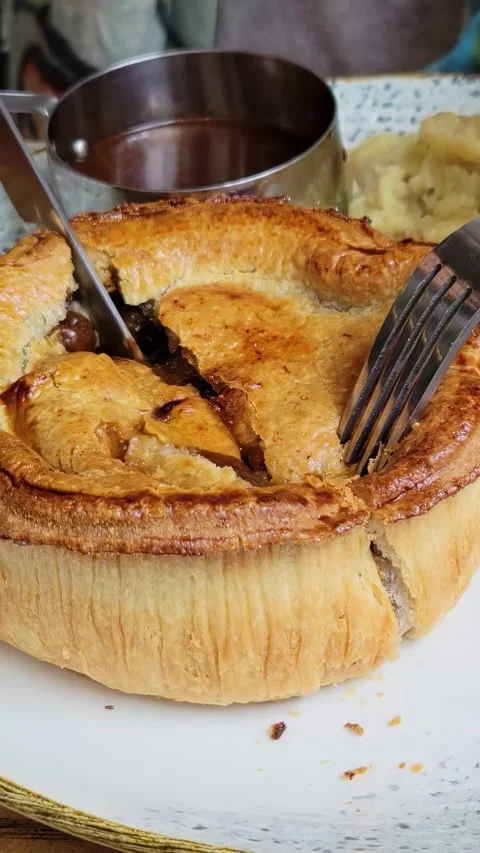 Steak and Ale Pie with Roasted Cabbage. vertical video Stock Footage 292288241